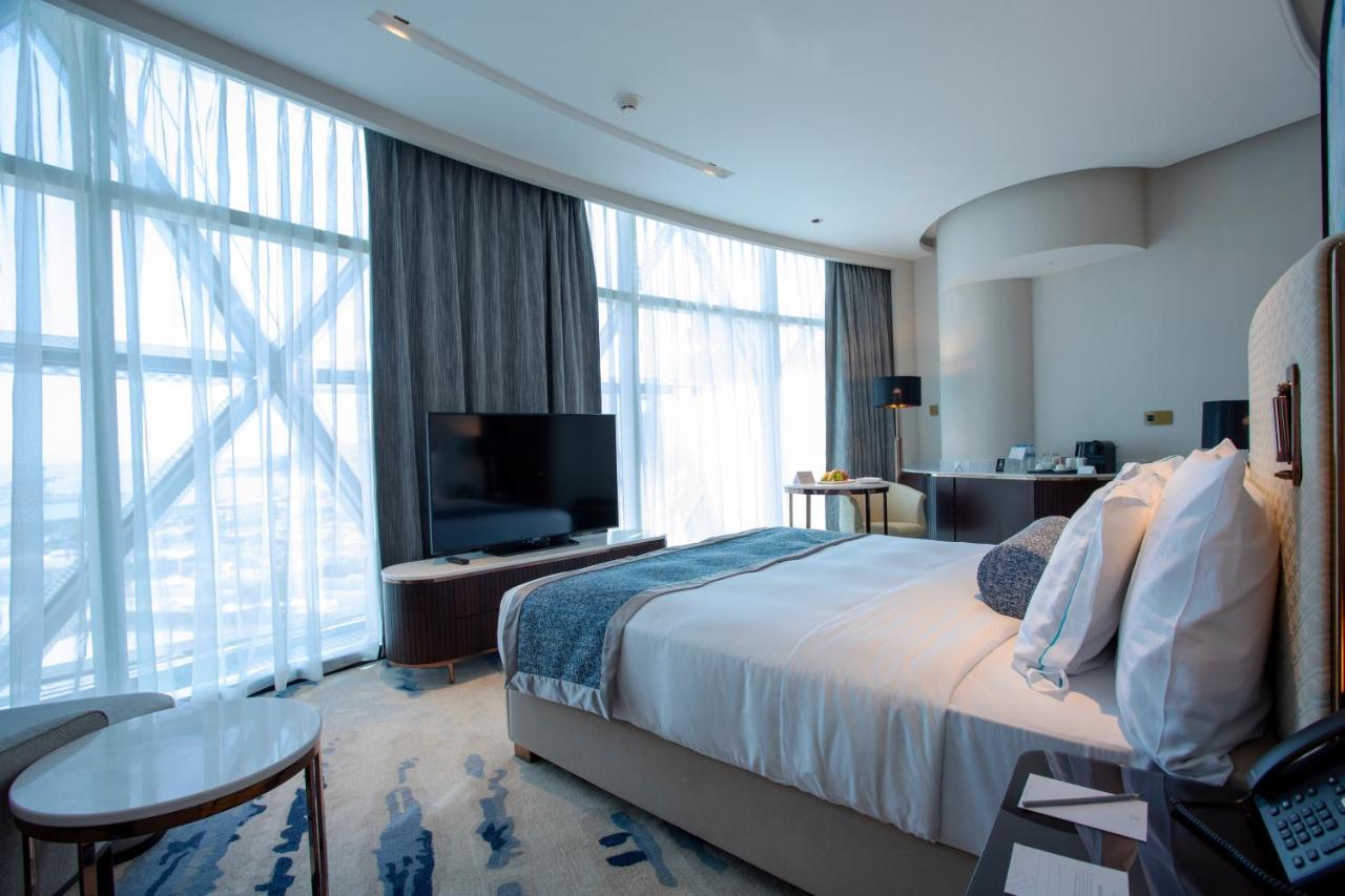 Century Marina Hotel - Lusail Εξωτερικό φωτογραφία A bedroom at the hotel