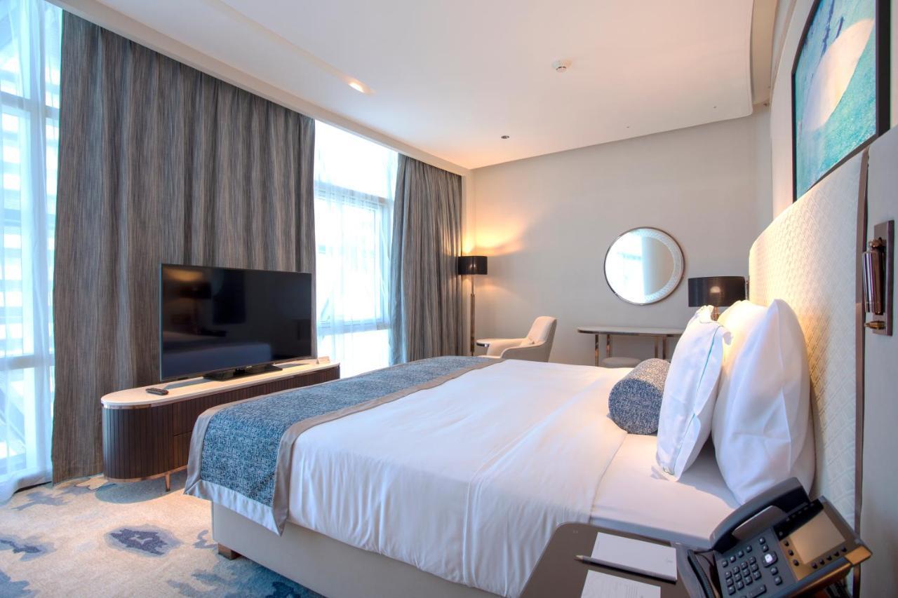 Century Marina Hotel - Lusail Εξωτερικό φωτογραφία A bedroom at the hotel