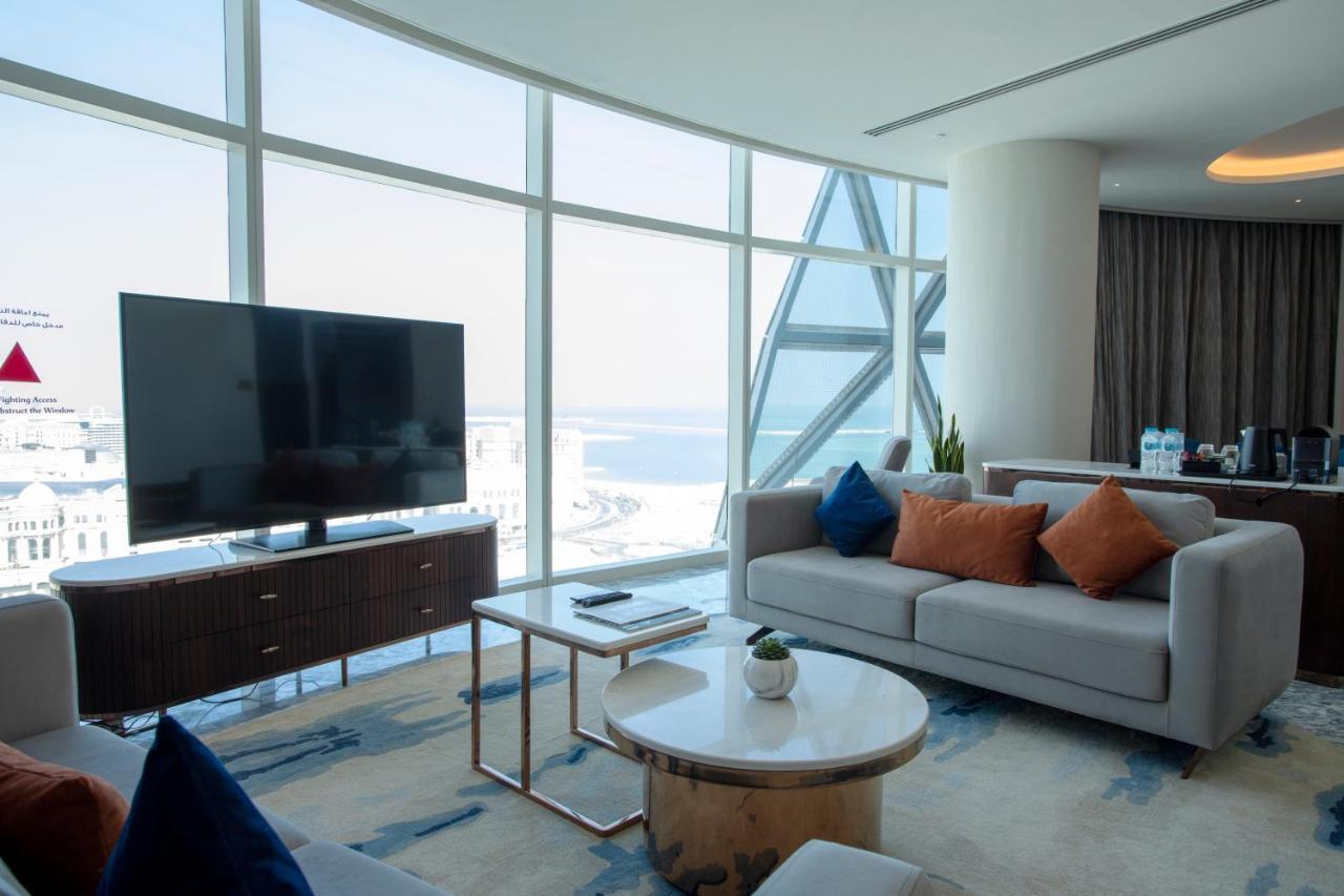Century Marina Hotel - Lusail Εξωτερικό φωτογραφία A living room in a suite at the hotel